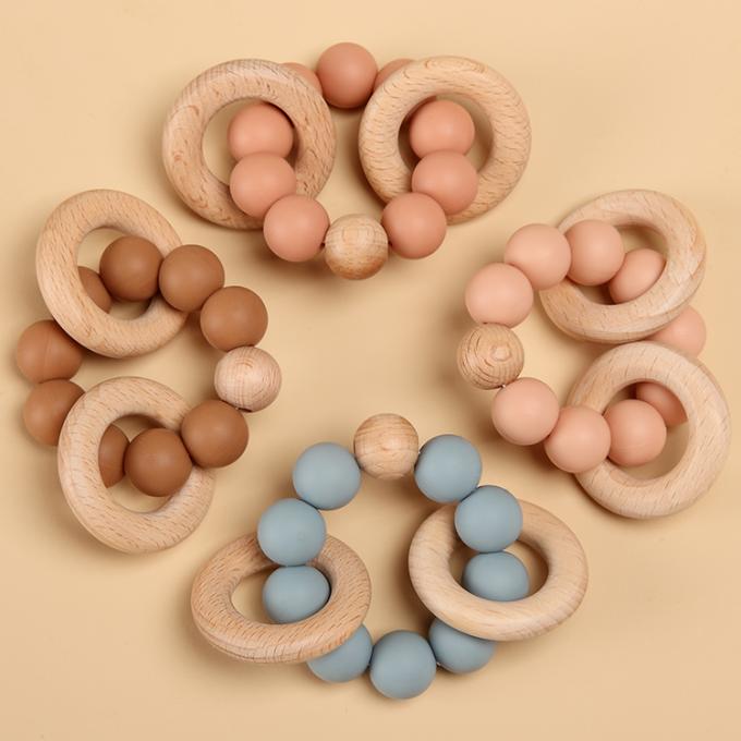 Ελεύθερη σιλικόνη Teether παιχνιδιών BPA οδοντοφυΐας μωρών συνήθειας φιλική προς το περιβάλλον με το ξύλινο μαλακό παιχνίδι 7.5*6*4cm δαχτυλιδιών φιλική DL13M03 ΣΟ Eco GUA