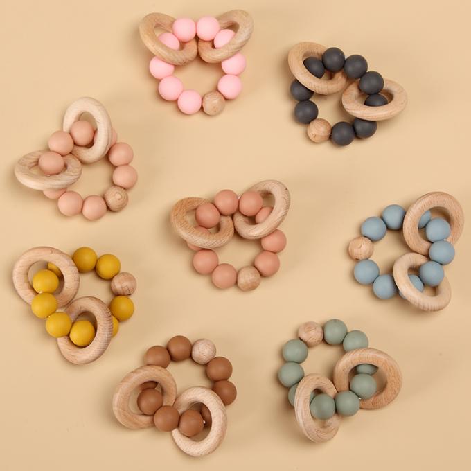 Ελεύθερη σιλικόνη Teether παιχνιδιών BPA οδοντοφυΐας μωρών συνήθειας φιλική προς το περιβάλλον με το ξύλινο μαλακό παιχνίδι 7.5*6*4cm δαχτυλιδιών φιλική DL13M03 ΣΟ Eco GUA