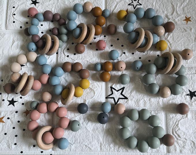 Teething διακοσμεί τη νέα μαλακή γύρω από διαμορφωμένη σιλικόνη χρώματος για τη σιλικόνη βαθμού τροφίμων μωρών με χάντρες 100%